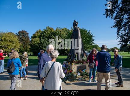 Runnymede, Surrey, UK. 17th September, 2022. A group of deaf people came to see the flowers laid by the HM Queen Elizabeth Magna Carta Statue in Runnymede today. Credit: Maureen McLean/Alamy Live News Stock Photo