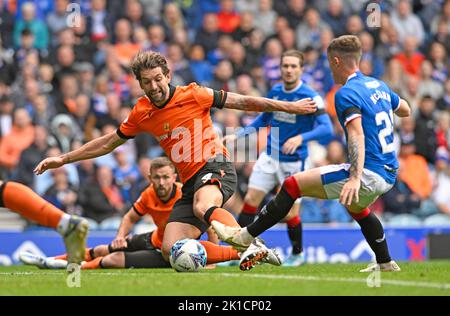 Glasgow, UK. 17th September 2022.   Charlie Mulgrew of Dundee Utd and Charlie McCann of Rangers during the cinch Premiership match at Ibrox Stadium, Glasgow. Picture credit should read: Neil Hanna / Sportimage Stock Photo
