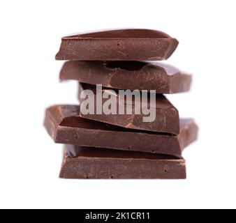 Chocolate pieces stack isolated on white background. Dark chocolate. Close up Stock Photo