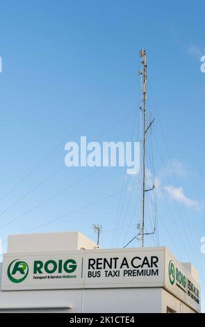 Cala d'Or, Spain; september 10 2022: Sign of the tourist transfer bus of the Roigbus company. Cala d'Or, island of Mallorca, Spain Stock Photo