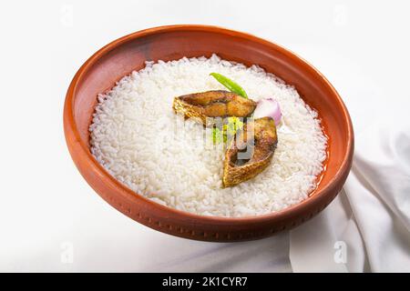 ilish panta Bengali new year festive dish. Boishakh panta ilish with green chilli and onion. Panta bhat is popular among Bengali's in India and Bangla Stock Photo