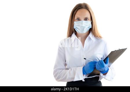 Office woman. New normal. Sales manager. Corporate work. Business lady protective mask gloves making notes on clipboard looking at camera isolated on Stock Photo