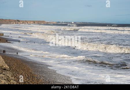 Waves breaking against Seaham Beach, Co. Durham, England UK Stock Photo