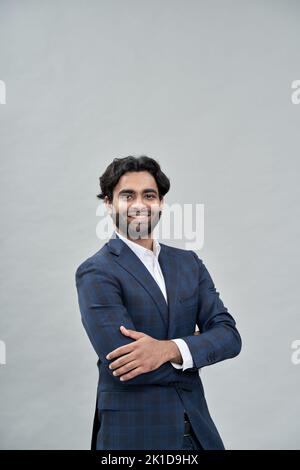 Happy successful young indian arab business man wearing suit, portrait Stock Photo