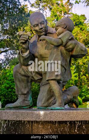 “Tears of Sorrow Tears of Joy,” a sculpture by Stephen Spears, honors military veterans at Henry George Bluff Park in Fairhope, Alabama. Stock Photo