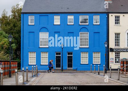 A blue painted house standing in Somerset Place, Swansea, Wales, UK Stock Photo