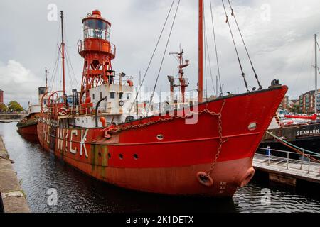 The Trinity House Lightship 91 Helwick moored along with Boats and yachts in Swansea Basin. Stock Photo