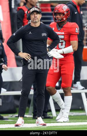 September 17, 2022: UNLV Rebels head coach Marcus Arroyo on the sidelines during the 1st half of the NCAA football game featuring the North Texas Mean Green and the UNLV Rebels at Allegiant Stadium in Las Vegas, NV. UNLV Rebels lead the North Texas Mean Green at halftime 23 to 20. Christopher Trim/CSM. Stock Photo