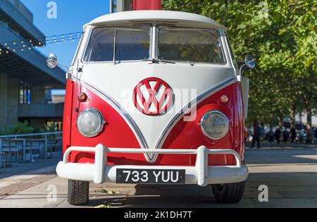 Red and white Volkswagen Beatle van on a sunny day in London Stock Photo