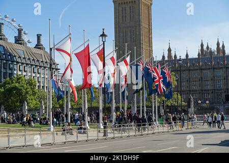 Flags of the Commonwealth hanging up in Parliament Square ready for the funeral of Queen Elizabeth II. London - 17th September 2022 Stock Photo
