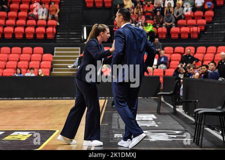 Oostende's assistant coach Gaelle Bouzin holds back Oostende's head coach Dario Gjergja during a basketball match between Belgian BC Oostende and Dutch Heroes Den Bosch, Saturday 17 September 2022 in Oostende, the BNXT Supercup between the Dutch and the Belgian champions. BELGA PHOTO JILL DELSAUX Stock Photo