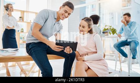 Creative, team collaboration with designer partner working on a tablet for web design or logo in an office. Happy employee showing digital graphic or Stock Photo