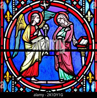 Nativity Window, stained glass by Oudinot of Paris, 1861, Feltwell Church, Norfolk. Annunciation by Archangel Gabriel to Virgin Mary Stock Photo