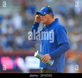 Kansas head coach Lance Leipold, right, talks with Kansas safety Kenny ...