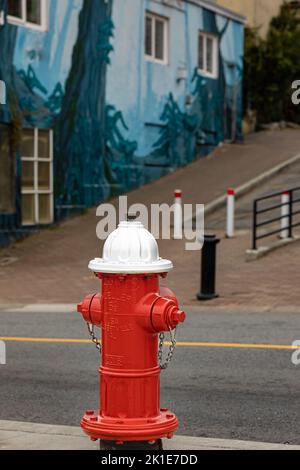 Red fire hydrant on a street of a White Rock city BC Canada. Fire hydrant for emergency fire access-September 15,2022. Street photo, nobody, selective Stock Photo