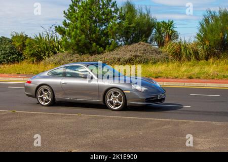 2002 Grey PORSCHE 911 CARRERA 2 TIPTRONIC S 3600cc 5 speed automatic; travelling to the Classic and speed event in Southport, UK Stock Photo