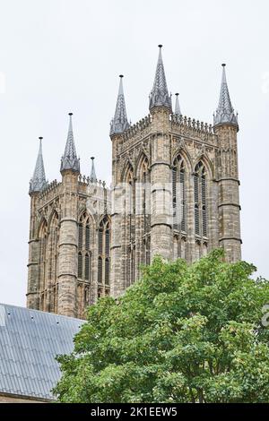 Twin towers at the west end of the medieval christian cathedral in Lincoln, England. Stock Photo