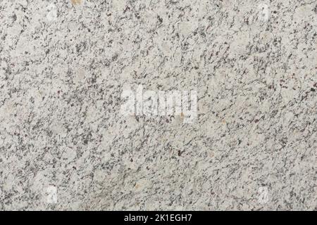 Moon white natural granite stone slab texture for perfect interior of background. Soft matt material texture for exterior home decoration, floor tiles Stock Photo