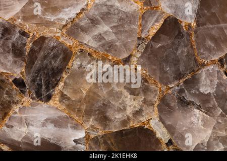 Smoky quartz stones on slab for interior, exterior design 3d decoration, ceramic wall, floor digital tiles. Brown beige matt gemstone background. Matt Stock Photo