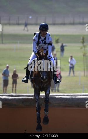 Yasmin Ingham (GBR) riding Banzai du Loir during the cross-country course of the Equestrian FEI Eventing World Championships on September 17, 2022 at Pratoni del Vivaro, Rome, Italy Stock Photo