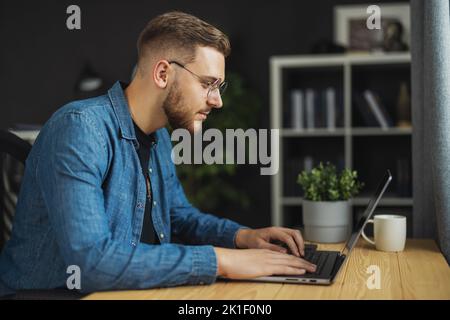 Man writing code Stock Photo