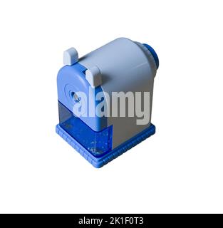 blue and white pencil sharpener for use with wood pencil isolated white background Stock Photo