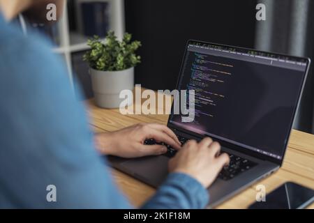 Man writing code Stock Photo
