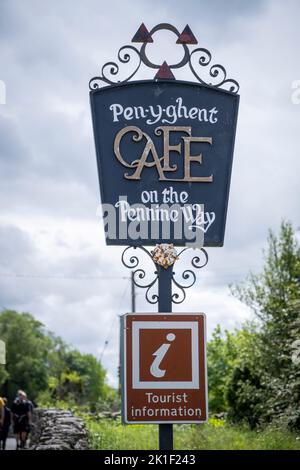 Pen Y Ghent cafe signpost at Ingleton in the Yorkshire Dales, England, on the Pennine Way national trail. Stock Photo