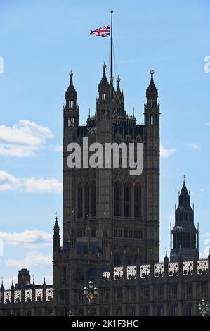 Union Jack flying at half-mast following the death of Queen Elizabeth aged 96. Houses of Parliament, Westminster, London. UK Stock Photo