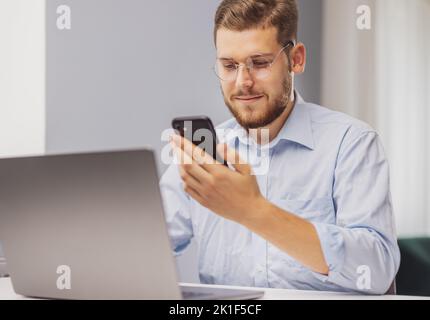 Man using smartphone Stock Photo