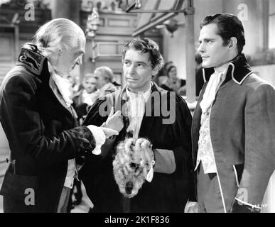 DONALD WOODS as Charles Darnay and RONALD COLMAN as Sydney Carton in A ...