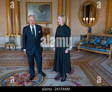 King Charles III receives Prime Minister Liz Truss in the 1844 Room at Buckingham Palace in London. Picture date: Sunday September 18, 2022. Stock Photo