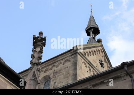 A low angle of a  bell tower of the monastery in Maulbronn on a sunny day Stock Photo