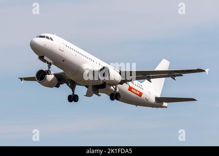 A closeup of an easy Jet Airbus A320-214 departing at Edinburgh Airport, Scotland Stock Photo