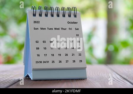 October 2022 table calendar with blurred nature background. Calendar concept. Stock Photo