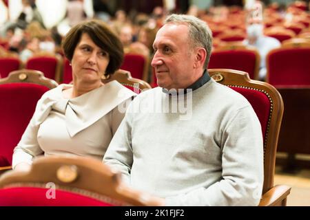 elderly couple watching play in the theater Stock Photo