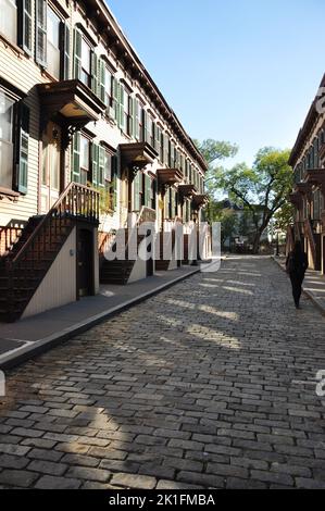 a vertical shot of historic houses in Jumel Terrace District in New York Stock Photo