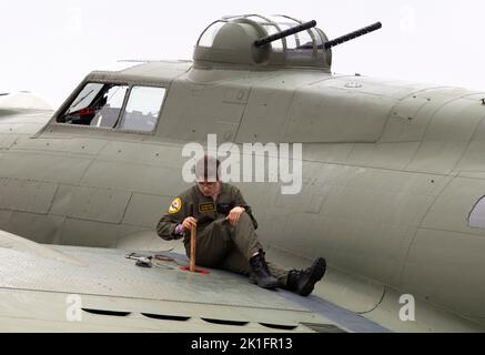 B17 Sally B Groundcrew checking fuel before it's flying display at the IWM Duxford Battle of Britain Airshow 10th September 2022 Stock Photo