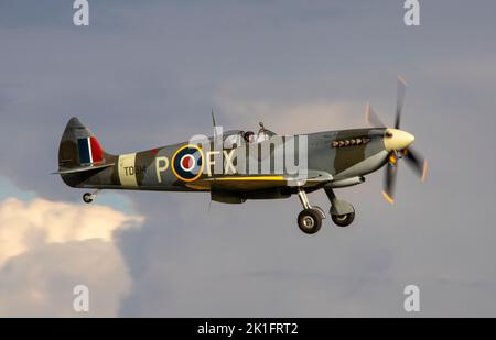 Supermarine Spitfire Mk.VIII, td314 landing at dusk, after it's flying display at the IWM Duxford Battle of Britain Air show 10th September 2022 Stock Photo