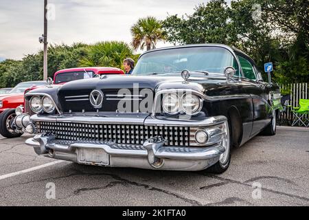 Tybee Island, GA - October 3, 2020: Front corner view of a 1958 Buick Super Riviera hardtop sedan at a local car show. Stock Photo