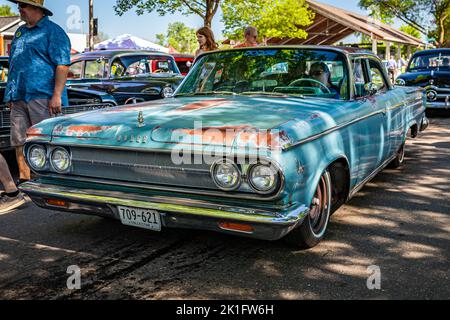 Falcon Heights, MN - June 18, 2022: Front corner view of a 1963 Dodge Custom 880 Sedan at a local car show. Stock Photo