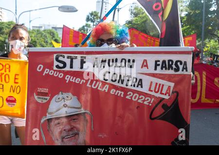 Brazilians protest carrying posters against the government of President Jair Bolsonaro in the city of Sal Stock Photo