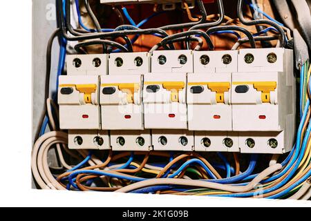 A box containing a junction of electric wires or cables close up Stock Photo