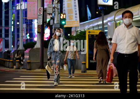 September 17, 2022, Taipei, N/A for Taiwan, Taiwan: Pedestrians wear facemasks in Taipei's Xiamen Din. (Credit Image: © Brennan O'Connor/ZUMA Press Wire) Stock Photo