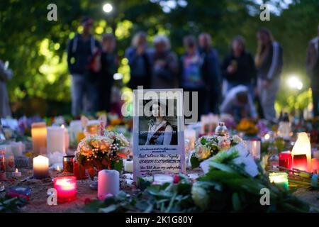 Floral tributes and candles from members of the public are laid in Green Park near to Buckingham Palace, London, ahead of the funeral of Queen Elizabeth II on Monday. Picture date: Sunday September 18, 2022. Victoria Jones/PA Wire Stock Photo