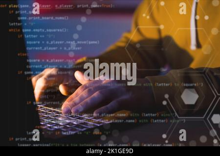 Man works on a laptop online, hands closeup. Stock Photo