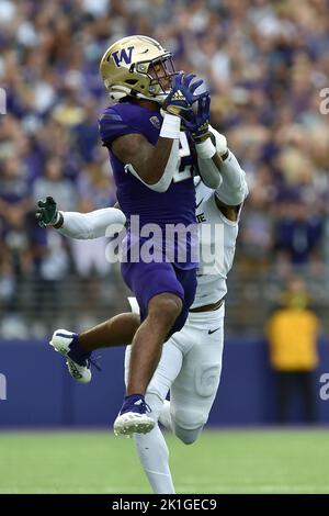 Seattle, WA, USA. 17th Sep, 2022. Washington Huskies wide receiver Ja'Lynn Polk (2) comes down with a long pass during the NCAA Football Game between the Washington Huskies and Michigan State Spartans at Husky Stadium in Seattle, WA. Washington defeated Michigan State 39-28. Steve Faber/CSM/Alamy Live News Stock Photo