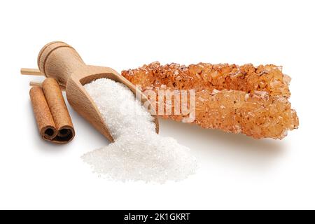 Sugar crystal sticks with cinnamon isolated on white Stock Photo