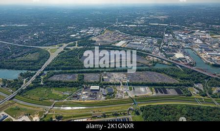 Aerial view, Bottrop harbor, coal storage at Rhine-Herne canal with wind turbine, Sturmshof, at Essen-North city limits, A42 freeway with Essen-North Stock Photo