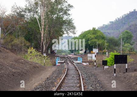 A scenic view of railway station at hill station platform of mountain village Kalakund near Mhow, Indore, Madhya Pradesh on a sunny summer day. Indian Stock Photo